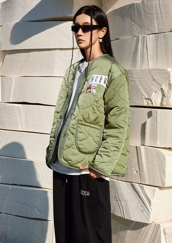 MEDM Quilted Jacket with Patched Flyer Design