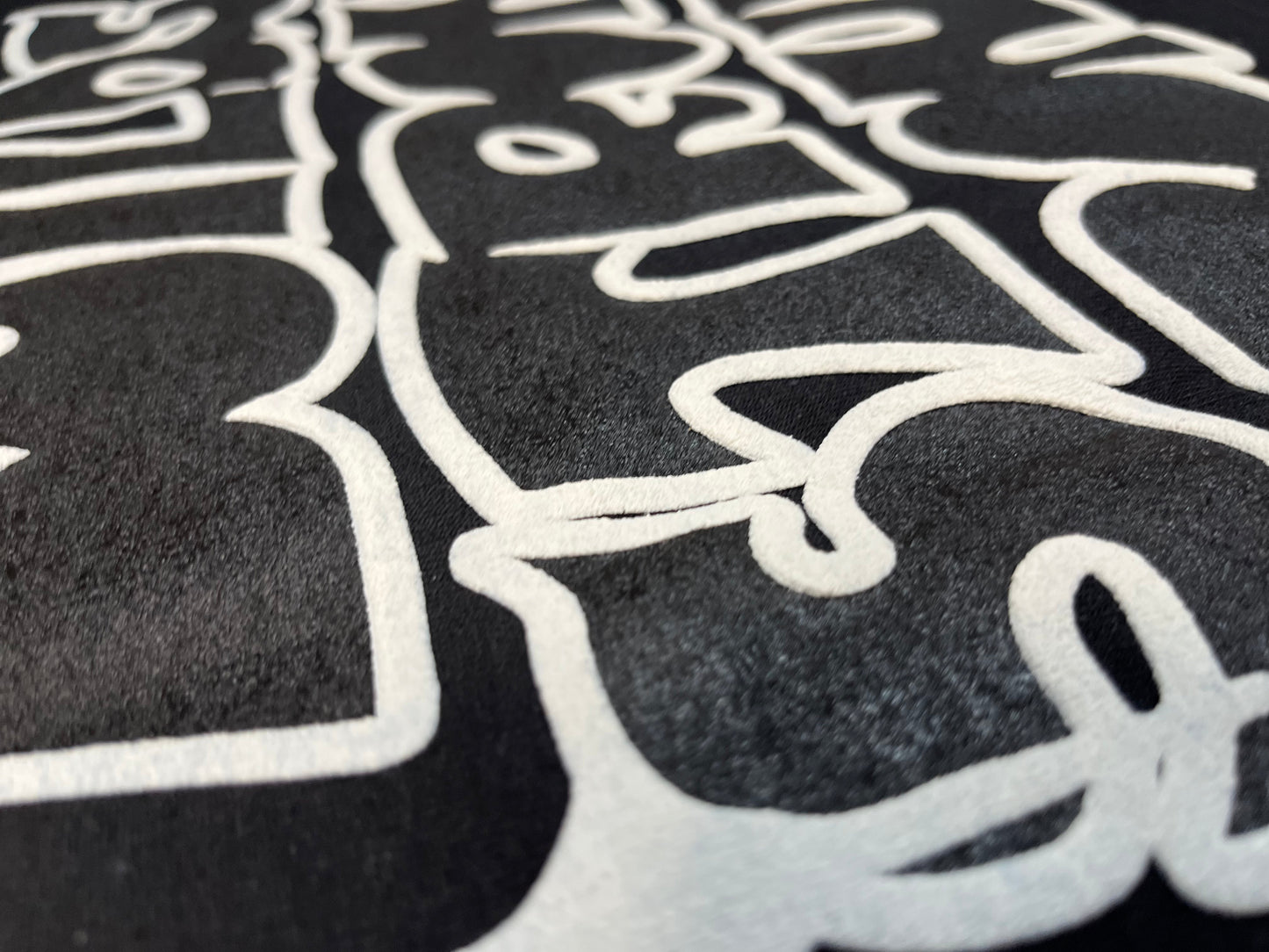 Anime Strong Bones Puff Print Hoodie in Black